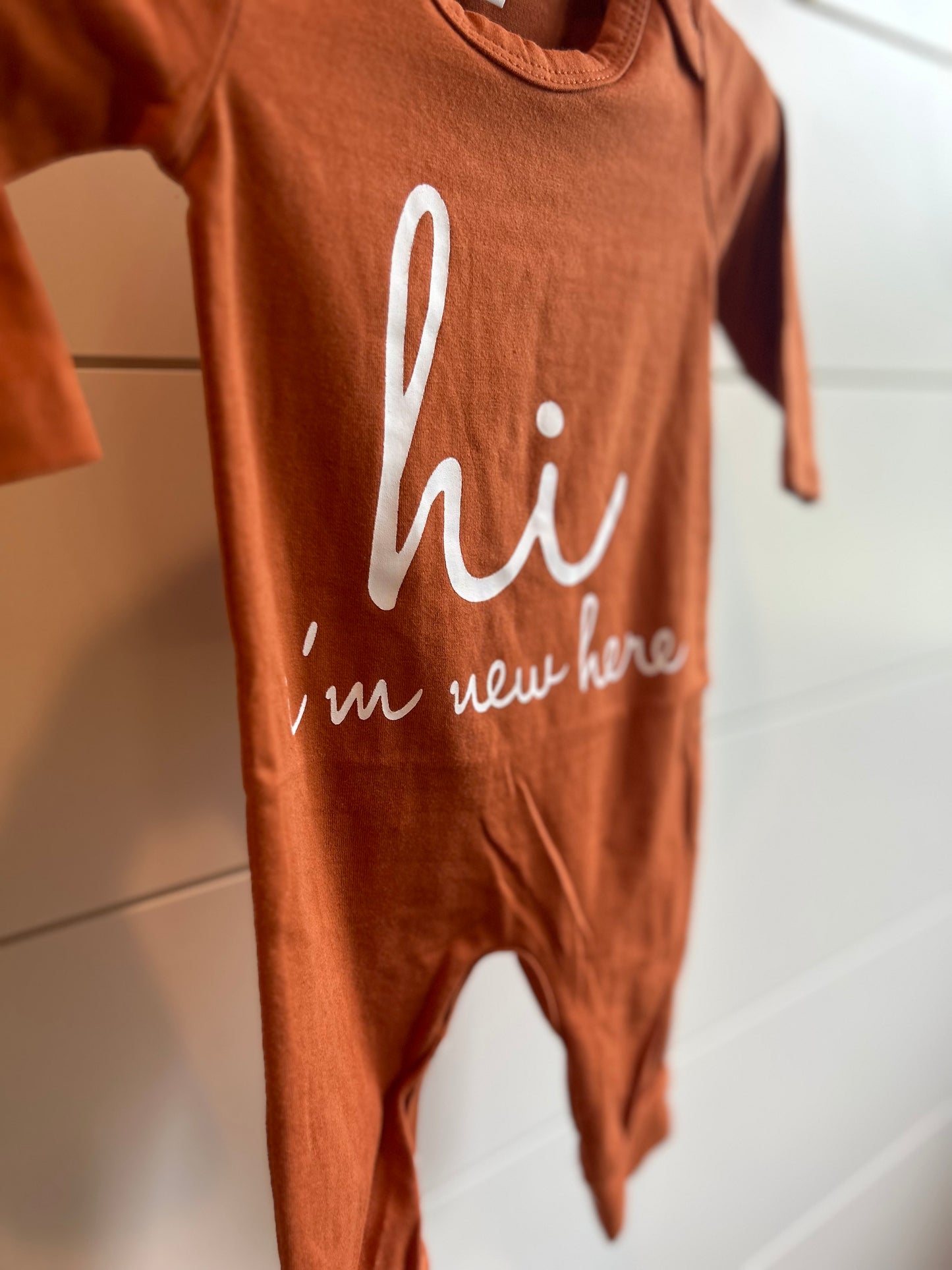 Hi, I’m New Here Long Sleeve Onesie - Multiple Colors
